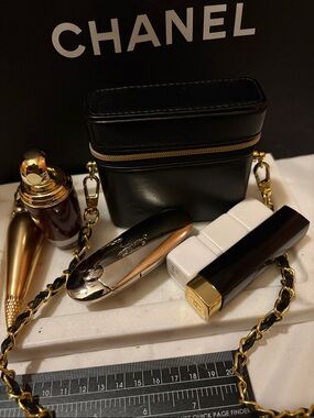 CHANEL Black Leather Mini Vanity Case with Gold Hardware and Chain Strap